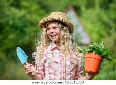 Nature Lover. Green Nature Protection. Small Girl Farmer Care About Plant In Pot. Farming Agricultur