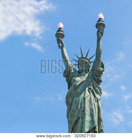 Cadaques, Spain - June 29, 2017: Statue Of Liberty, Bronze. Sculpture Inspired By Dalinian By The Ar