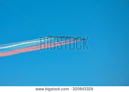 Group Of Fighters With Painted Russian Flag In The Sky On Parade Of Victory In World War Ii In Mosco