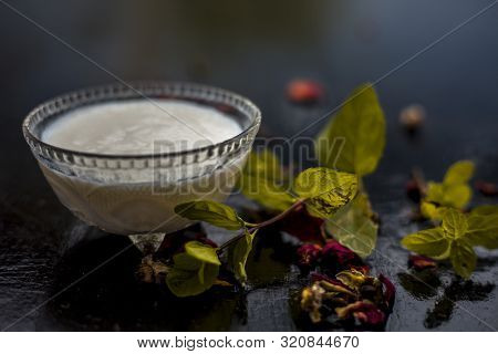Homemade Diy Face Mask On The Wooden Surface Consisting Of Yogurt,multani Mitti Or Mulpani Mitti (fu