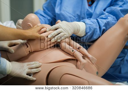 Details With Plastic Dummies Representing A Woman And Her Newly Born Baby Used By Medics And Midwive