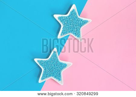 Blue Nonpareils Cake Candy Sprinkles In Two White Star Bowls On Pink Blue Background In Flat Lay Wit