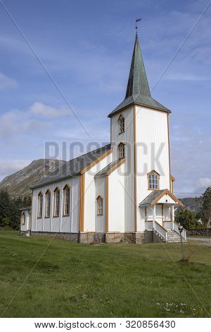 Valberg Church, Vestvagoy, Norway, against a blue sky