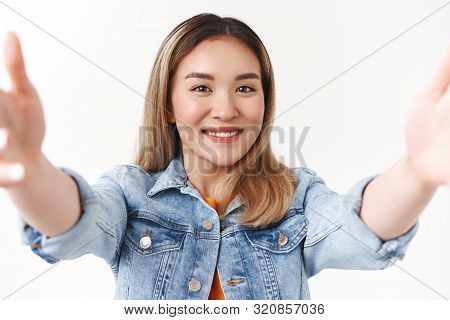 Girl Holding Tablet Taking Selfie Smiling Delighted Shy Cute Toothy Grin Extend Arms Sideways Camera