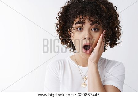 Wow No Way, You Kidding Me. Impressed Surprised Curly-haired Woman Learn Shocking Rumor Drop Jaw Say