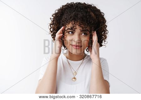 Stylish Silly Curly-haired Female Student Smiling Look Away Touching Head Temples Feel Pressured Bra