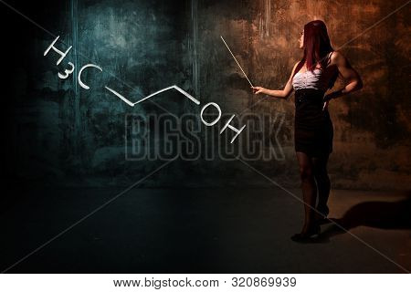 Sexy Girl Or Secretary Or Female Student Presenting Handdrawn Chemical Formula Of Propanol N-propano