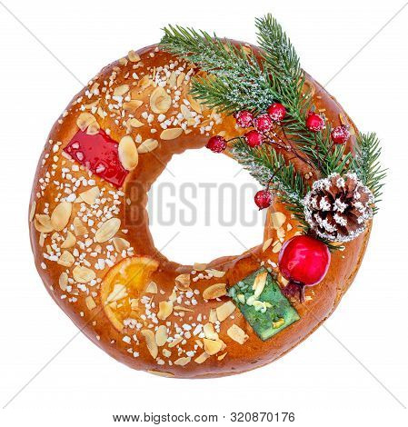 Christmas Fruit Cake Decorated With Fir Tree Branch, Glazed Fruits  And Nuts Isolated On White Backg