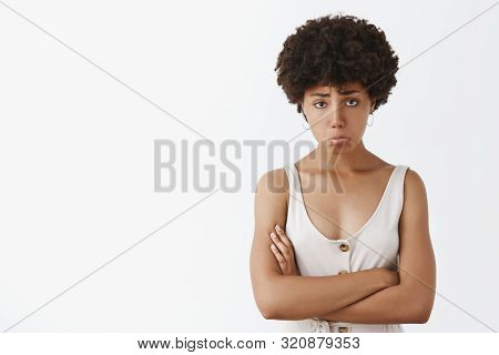 Girl Feeling Upset And Disappointed After Losing Cometition, Standing Silly And Gloomy With Sad Expr