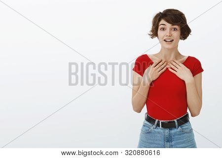 Surprised Tender Hopeful Young Cute Girl Short Pixie Haircut Hold Hands Chest Grateful Thrilled Look