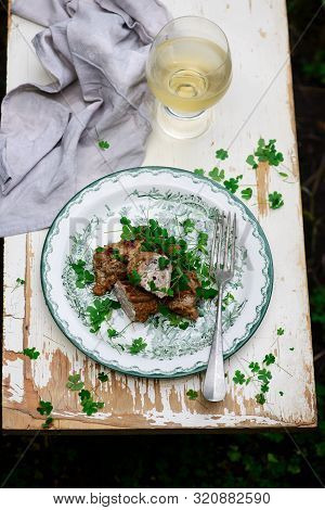 Veal Saltimbocca With Sorrel..selective Focus .style Rustic