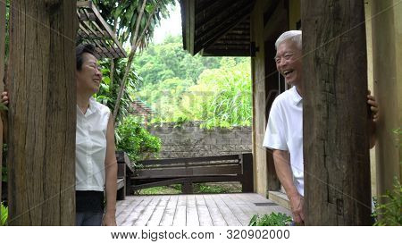 Happy Asian Senior Elder Hide And Seek Playful