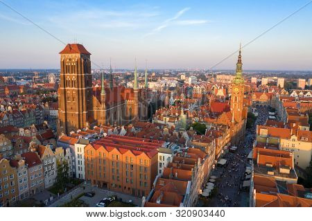 Gdansk Is A City In Poland. Gdansk In The Morning Rays, The Sun Is Reflected From The Roofs Of The O