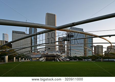 Chicago, Illinois 08-09-19 Jay Pritzker Pavillion By Architect Frank Gehry In Early Morning Summer L