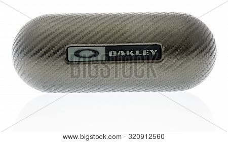 Wnneconne, Wi - 4 September 2019:  A Package Of Oakley Polarized Sunglasses Case On An Isolated Back