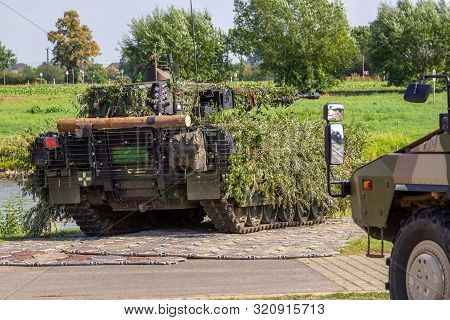 German Army Infantry Fighting Vehicle  Drives On Tactical Exercise At Military Training Area