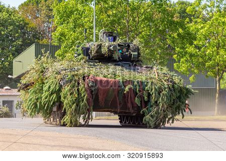 German Army Infantry Fighting Vehicle  Drives On Tactical Exercise At Military Training Area