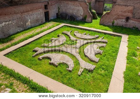 Courtyard Garden Of The Ancient Ruins Of The Domus Augustana On Palatine Hill In Rome