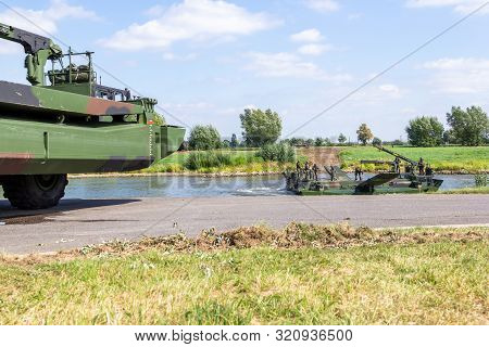 Minden / Germany - September 4, 2019: German Tank Pioneer Battalion Trained A Tank Crossing Over A R