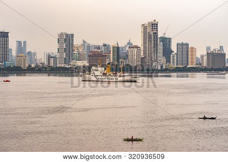 Manila, Philippines - March 5, 2019: South Harbor Area Early Morning. Skyline With Tall Buildings, S