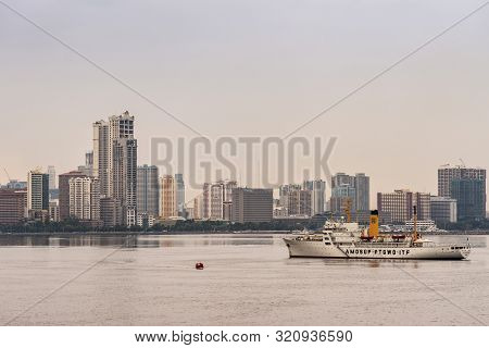 Manila, Philippines - March 5, 2019: South Harbor Area Early Morning. Skyline With Tall Buildings, S