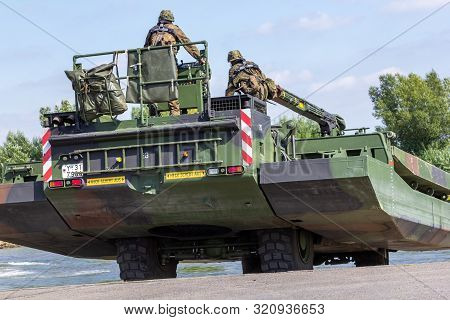 Minden / Germany - September 4, 2019: German Tank Pioneer Battalion Trained A Tank Crossing Over A R