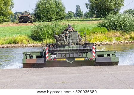 Minden / Germany - September 4, 2019: German Tank Pioneer Battalion Trained A Tank Crossing Over A R