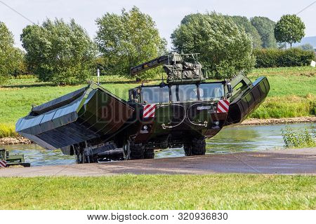 Minden / Germany - September 4, 2019: German Tank Pioneer Battalion Trained A Tank Crossing Over A R