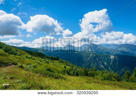 Svaneti Mountain And Village Landscape At The Trekking And Hiking Route Near Mestia Village In Svane