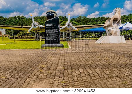 Cheonan, South Korea; August 8, 2019: Decommissioned Douglas C-47 Skytrain Behind Information Plague