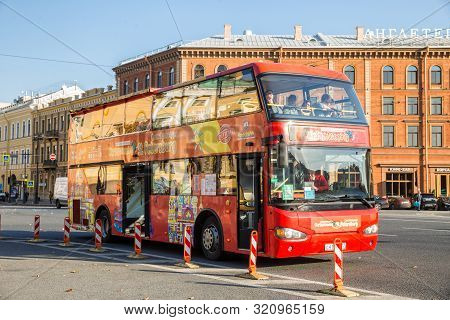 St. Petersburg, Russia - October 16, 2018: Red City Sightseeing Bus Awaits Passengers Near St. Isaac