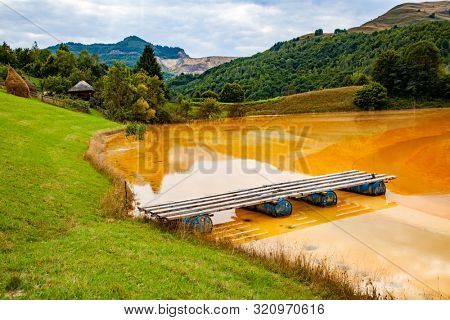 nature pollution from copper mine at lake Geamana, Romania