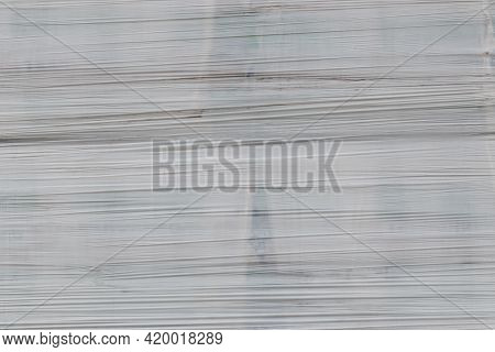 White Shrink Wrap Film With Horizontal Folds - Full Frame Background And Flat Texture