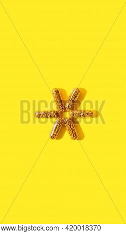 Homeopathic Pills, Capsules With Bee Pollen On A Bright Yellow Background. Natural Remedy For Colds
