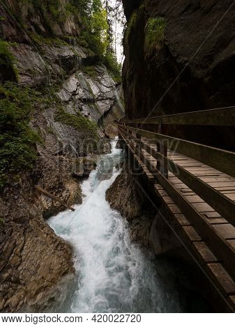 Nature Landscape Panorama Of Wooden Boardwalk Path In Raw Wild Mountain Stream River Gorge Ravine Wi
