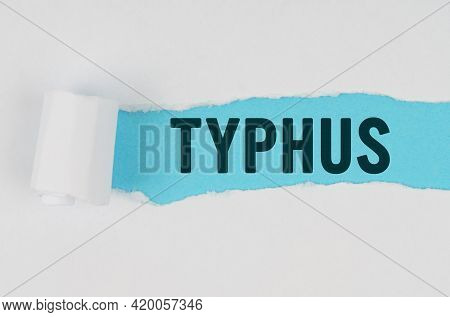 Medicine And Health Concept. In The Middle Of A White Sheet Of Paper, A Tear Is Made Under Which, On