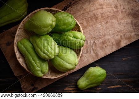 Chayote Squash Fruit (mirliton, Pipinola Or Choko) In A Basket On Wooden Background, Edible Fruit Ea