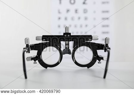 Trial Frame On Light Background, Closeup. Ophthalmologist Tool