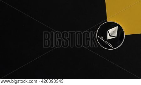 Ethereum Or Eth Silver Coin On Black And Yellow Banner With Copy Space For Text. Cryptocurrency And