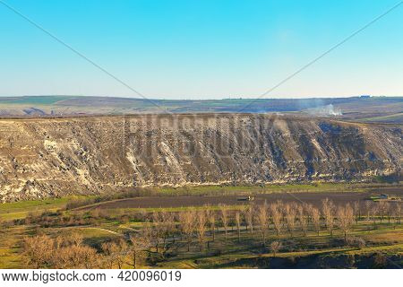 Hills Of Orheiul Vechi In Moldova . Panorama Of Agricultural Fields And Rocky Hills