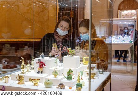 Saint Petersburg, Russia - 24 March, 2021. People wearing protection mask in Faberge Museum. A unique collection of jewelry belonging to the royal family, made by famous Faberge jewelers