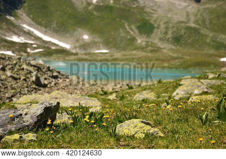 Swiss Mountain Lake In The Canton Of Grisons. Beautiful Hiking Landscape In The Mountains With Lakes