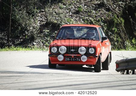 Leiria, Portugal - februar 2: Goncalo Figueiroa drev en Ford Escort 1600 under 2013 amatør Winte