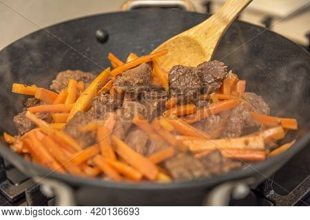 Cooking Pilaf In A Cauldron. A Step By Step Recipe For Cooking Pilaf, Cut The Beef Into Pieces And F