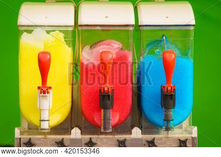Slush Machine. Slushy Ice Made Colorful Drink Refreshing During Summer. Granita Distributor. Differe