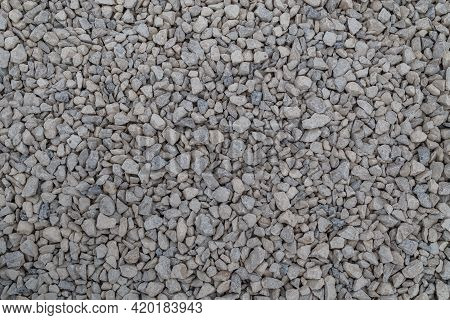 Dry White Limestone Ballast Flat Full Frame Background. Small Gray Dusty Broken Macadam Stones Textu