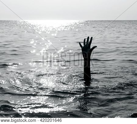 Dramatic Black And White Scene With The Hand Of The Castaway Who Is About To Drown In The Middle Of 