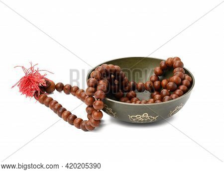 Prayer Beads And Copper Singing Bowl Isolated On White Background. Musical Instrument For Meditation