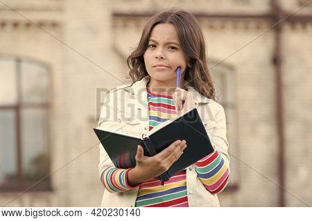 Making Notes. Inspired Poet. Talented Cute Schoolgirl. Access To Much More Than Just Book. Knowledge