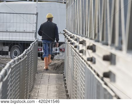 Construction Worker At A Building Site